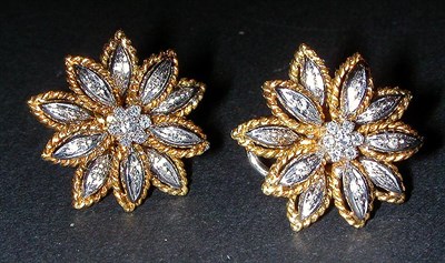 Lot 155 - Pair of Diamond Flower Earclips 14 kt. yellow...