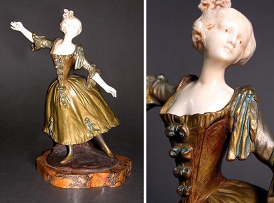 Lot 430 - Patinated-Bronze and Faux Ivory Figure of a...