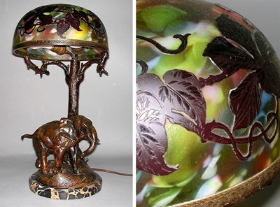 Lot 381 - Art Nouveau Style Figural Lamp The mottled...