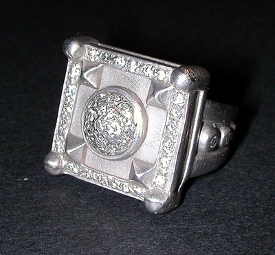 Lot 81 - Diamond Dome Ring The 18 kt. white gold...