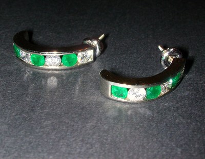 Lot 277 - Pair of Emerald and Diamond Earrings 14 kt....