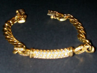 Lot 284 - Gold and Pave Diamond Bracelet 18 kt. yellow...
