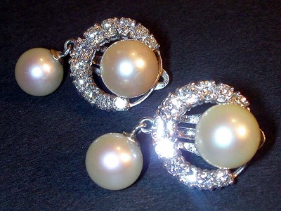 Lot 273 - Pair of Cultured Pearl and Diamond Earclips...