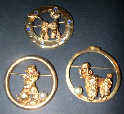 Lot 51 - Group of Three Assorted Dog Pins 14 kt. yellow...