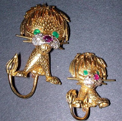 Lot 174 - Two Gold Lion Pins 14 kt. yellow gold,...