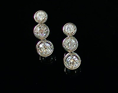 Lot 463 - Pair of Three Stone Diamond Earclips Each...