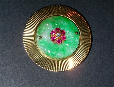 Lot 135 - Circular Jade Brooch The engine turned 14 kt....