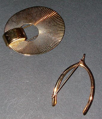 Lot 113 - Two Gold Pins 14 kt. yellow gold, the first...