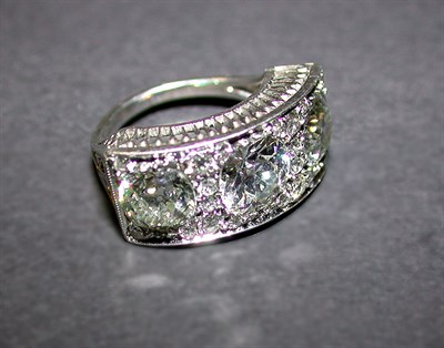 Lot 428 - Three Stone Diamond Ring White gold, the...