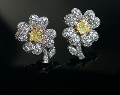 Lot 462 - Pair of Diamond Flower Earclips Platinum, each...