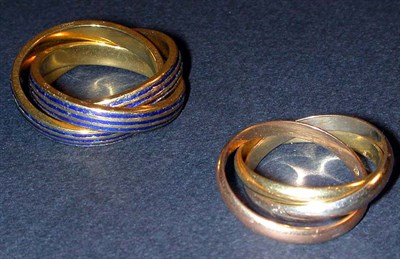 Lot 5 - Two Gold Rolling Rings 14 kt. yellow gold, one...