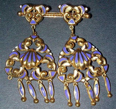 Lot 21 - Gold and Enamel Pin Yellow gold, the twisted...