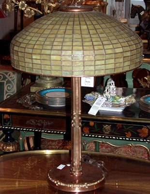 Lot 389 - Tiffany Studios Leaded Glass and Bronze Lamp...