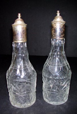 Lot 908 - Pair of Colorless Cut Glass Bottles with...
