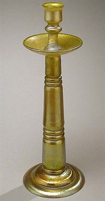 Lot 366 - Loetz Glass Candlestick In gold iridescent...