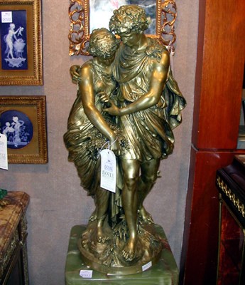 Lot 206 - Bronze Figural Group of a Classical Youth and...