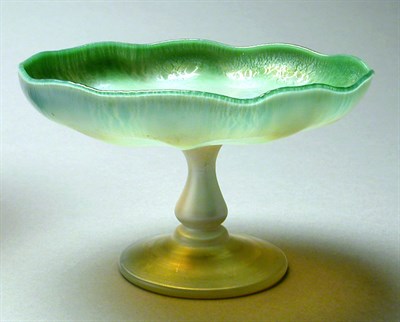 Lot 405 - Iridescent Glass Compote The ruffled rim in...