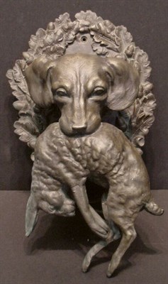 Lot 45 - Bronze Wall Fixture. Depicting a hound with a...