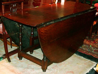 Lot 203 - Provincial George III Oak Gate Leg Table The...