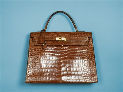 Lot 884 - Hermes Tan Alligator Kelly Bag French, mid...