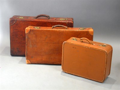 Lot 929 - Three Leather Suitcases English and American...