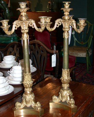 Lot 351 - Pair of Empire Style Bronze Four-Light Candelabra