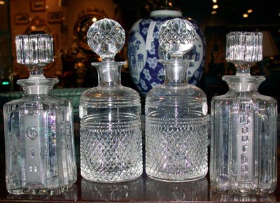 Lot 303 - Group of Four Colorless Etched or Cut Glass...