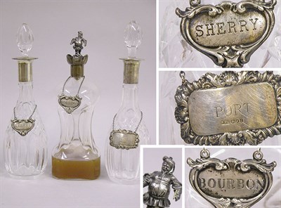 Lot 423 - Group of Three Silver Mounted Cut Glass Decanters
