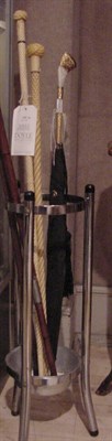 Lot 139 - Group of Four Canes and an Umbrella