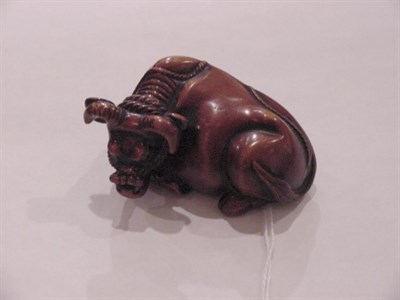 Lot 150 - Boxwood Netsuke of a Recumbent Ox Kyoto School,...