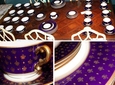 Lot 187 - Gilt and Cobalt Decorated Porcelain Dinner...