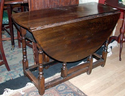Lot 240 - Provincial English Oak Gate-Leg Table