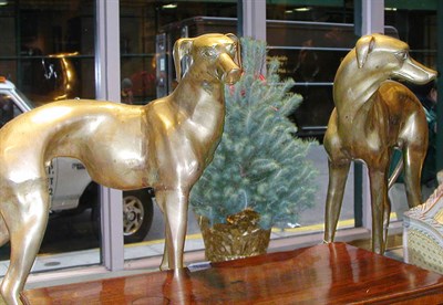 Lot 636 - Pair of Patinated-Metal Figures of Dogs