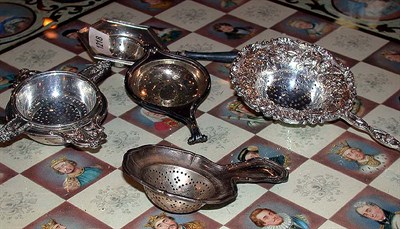 Lot 488 - Group of Twelve Sterling Silver Tea Strainers...