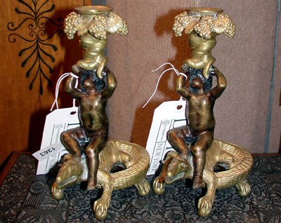 Lot 103 - Pair of Bronze Figural Candlesticks Each cast...