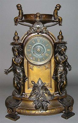 Lot 568 - Renaissance Style Patinated-Metal Mantel Clock...