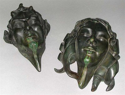 Lot 411 - Pair of Art Deco Bronze Masks Depicting a man...