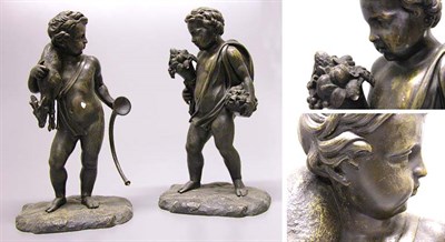 Lot 421 - Pair of Patinated-Bronze Partially Nude Male...