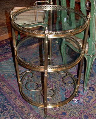 Lot 167 - Louis XVI Style Brass and Glass Circular Bar...