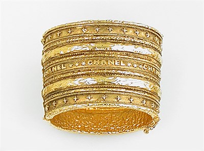 Lot 734 - Chanel Gilt Cuff The rigid bangle enhanced...