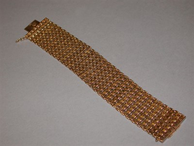 Lot 306 - Wide Gold Bracelet 18 kt. red gold, the 1 1/4...