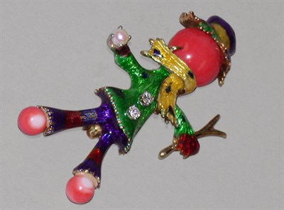 Lot 126 - Coral, Diamond and Enamel Scarecrow Pin 18 kt....