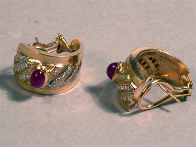 Lot 97 - Pair of Ruby and Diamond Earclips Each 14 kt....