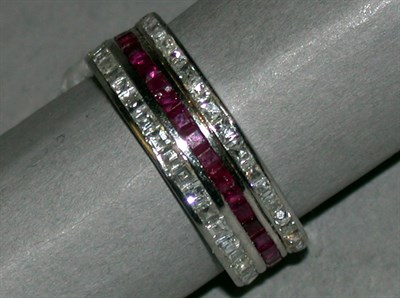 Lot 103 - Diamond and Synthetic Ruby Band 14 kt. white...