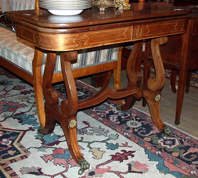 Lot 524 - Regency Style Inlaid Mahogany Fold-Over Table