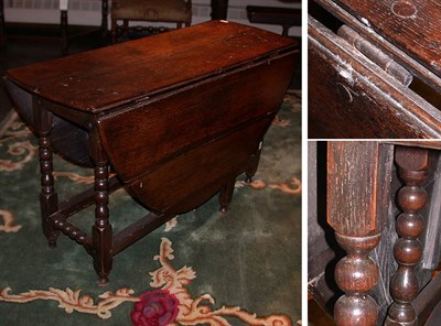 Lot 112 - Provincial George III Oak Gate Leg Table