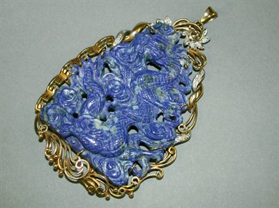 Lot 229 - Large Carved Lapis Lazuli Pendant The 14 kt....