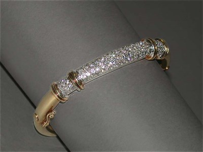 Lot 132 - Diamond Bangle Bracelet 14 kt. yellow and...