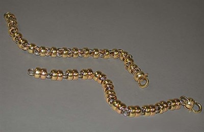Lot 194 - Two Heavy Gold Bracelets 18 kt. yellow, white...