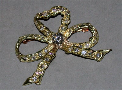 Lot 183 - Diamond Bow Pin Designed as a tied ribbon bow,...
